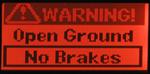 Screen displays warning open ground no brakes.