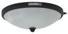 Gustafson textured black RV ceiling light with glass shade.