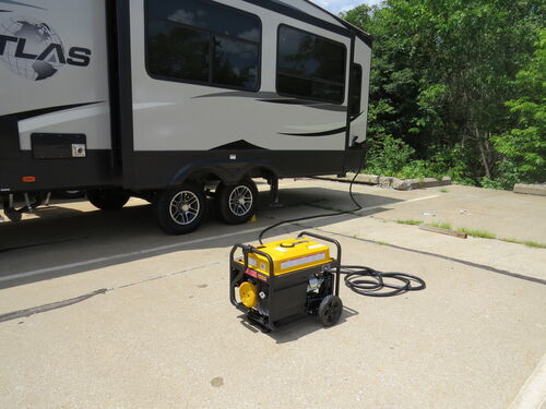 Portable generator connected to camper image