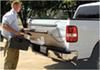 man opening truck tailgate with Hopkins easylift assist. 