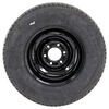 Karrier radial tire with 6 on 5 half bolt pattern black steel wheel. 
