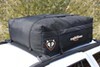 Rightline Gear Ace 2 rooftop cargo bag mounted on the roof of a silver SUV.