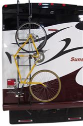 Ladder mounted bicycle carrier on RV ladder with with bicycle installed