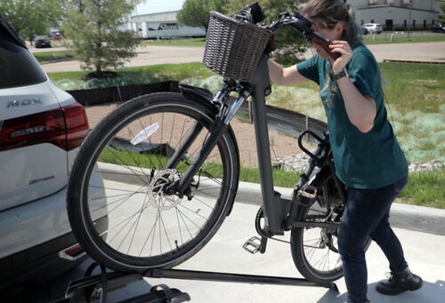 Wheeling e-bike onto Yakima OnRamp bike rack
