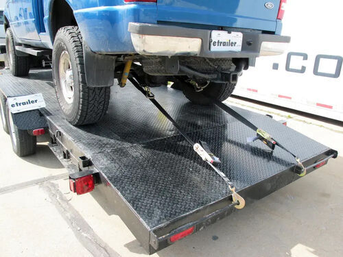 Towing Vehicle on Trailer