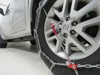 Snow Tire Chains on Vehicle