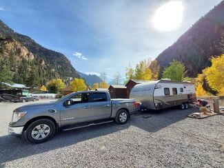 Truck and Travel Trailer Pulled into Campsite