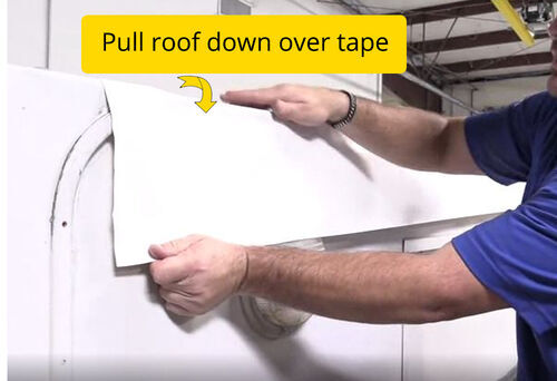 Pull roof down over tape