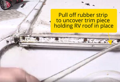 Removing rubber strip to expose trim piece