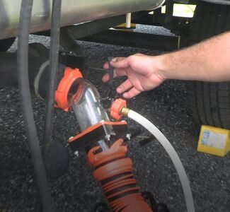 Pulling RV gray tank valve