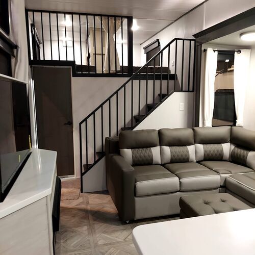 Layout with sofa and stairs