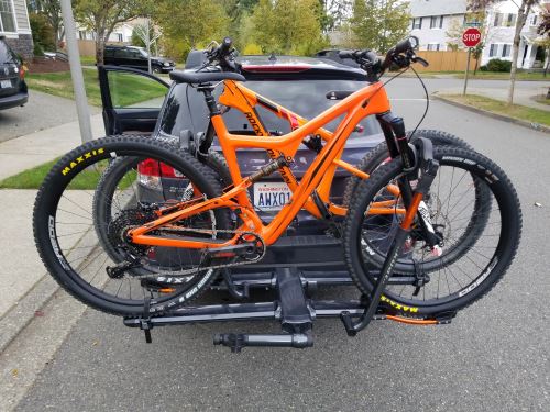 Orange bikes on hitch rack