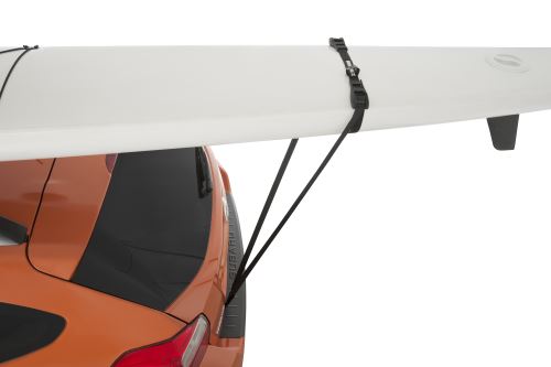 Kayak secured to car with bow/stern strap and anchors (back view)