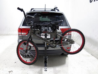 Bike rack on tow vehicle with built-in ball mount