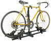 Yellow bicycle mounted on a Thule Doubletrack platform bike rack.