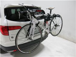 Yakima trunk-mounted bicycle carrier on SUV with bike loaded