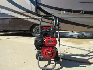 Pressure Washer in Front of RV